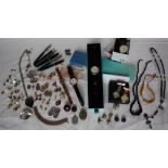 Assorted costume jewellery including talking watches, brooches, necklaces, pens, cufflinks,