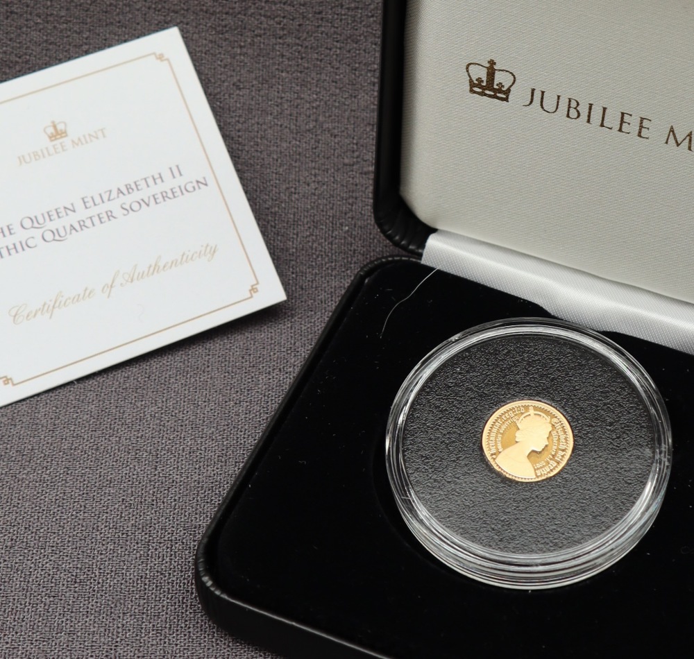 An Elizabeth II gothic gold quarter sovereign,