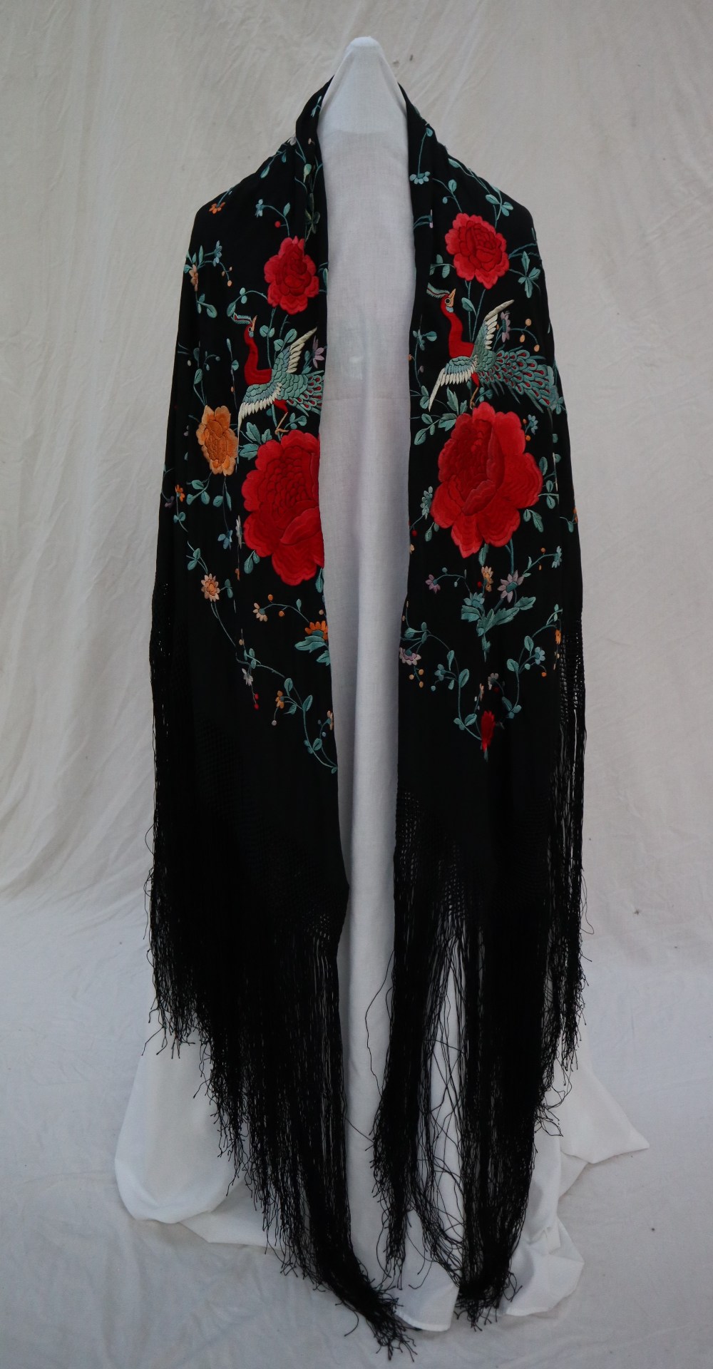 A silk piano shawl, the black ground profusely embroidered with peacocks, - Image 4 of 16