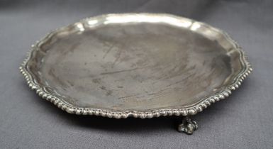 A George V Silver Salver with a gadrooned rim, on three claw and ball feet, Sheffield, 1913,
