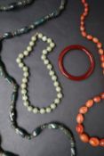 A light green hardstone beaded necklace, possibly jade,