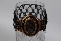 A Victorian mourning bracelet, the yellow metal top of oval form with plaited hair,