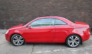 A 2008 Volkswagen EOS Sport T FSI in red, 1984cc, one previous owner,