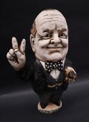 Groggs - A John Hughes pottery figure of Winston Churchill holding a cigar in his left hand and