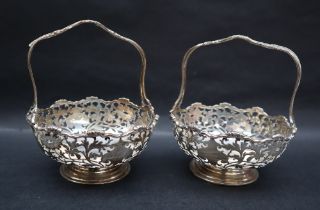 A pair of George V silver fixed handle bon bon dishes,