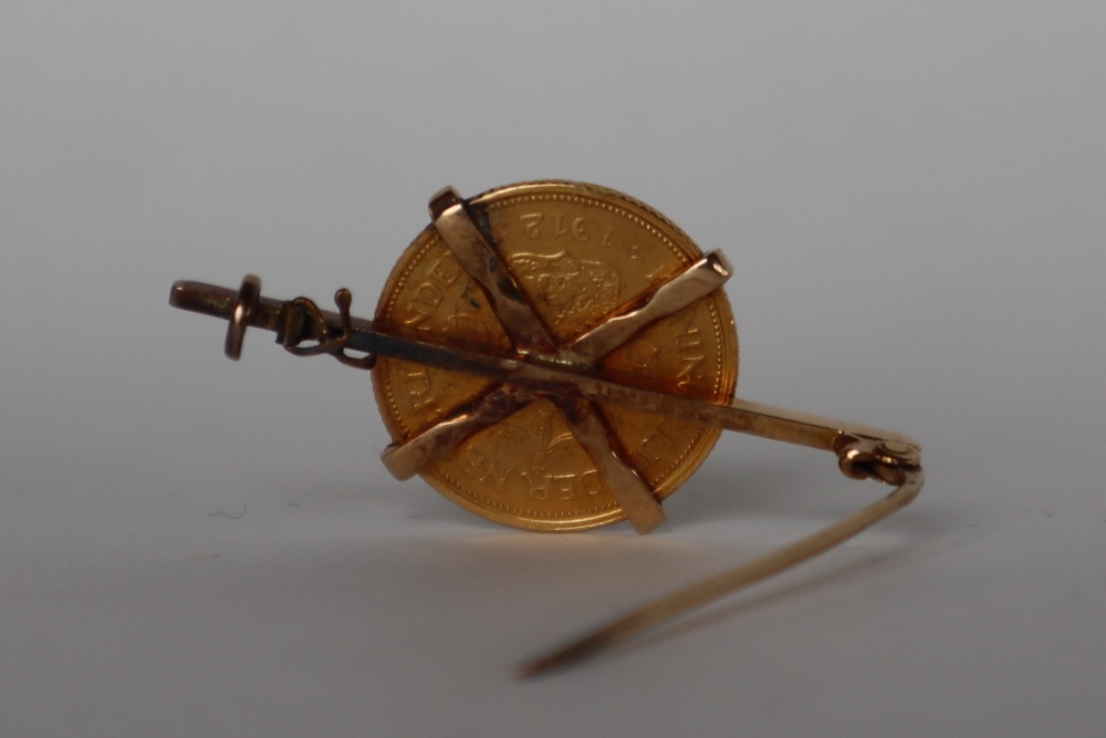 A 1912 5 Gulden Wilhelmina gold coin set into a yellow metal bar brooch, overall approximately 5. - Image 2 of 2
