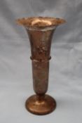 A George V silver bud vase with a flared rim and ring turned tapering column on a spreading foot,