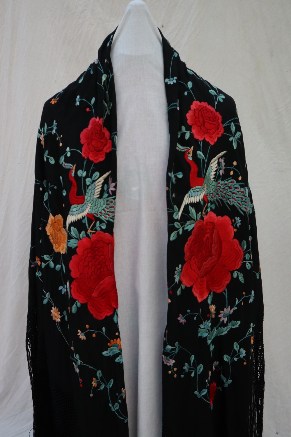 A silk piano shawl, the black ground profusely embroidered with peacocks, - Image 5 of 16
