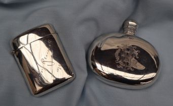 A Victorian silver hip flask, of oval form with screw on lid, engraved, London, 1865,