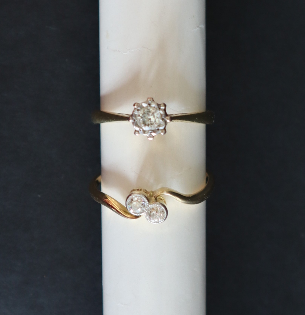 A solitaire diamond ring, set with around faceted diamond to an 18ct gold shank, - Image 2 of 4