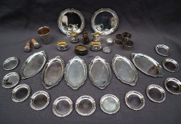 A collection of continental 800 standard pin trays, dishes, miniature jugs,