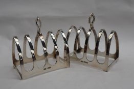 A pair of George V silver four division toast racks,