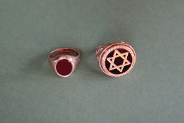 A 9ct gold ring with star of David motif, size M together with a 9ct gold hardstone set signet ring,