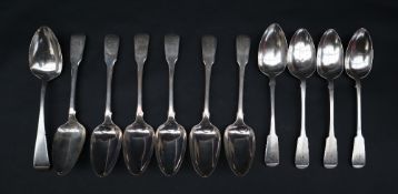 A set of six George III Scottish silver fiddle pattern table spoons, Edinburgh, 1813,