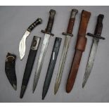 A British 1888 pattern MKI 2nd type bayonet and scabbard together with a German bayonet,