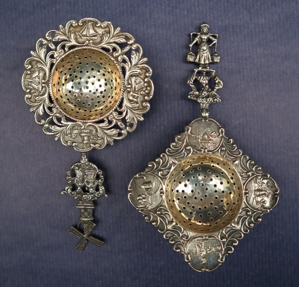 Two continental white metal sifting spoons with figural tops and leaf scrolls, - Image 2 of 3