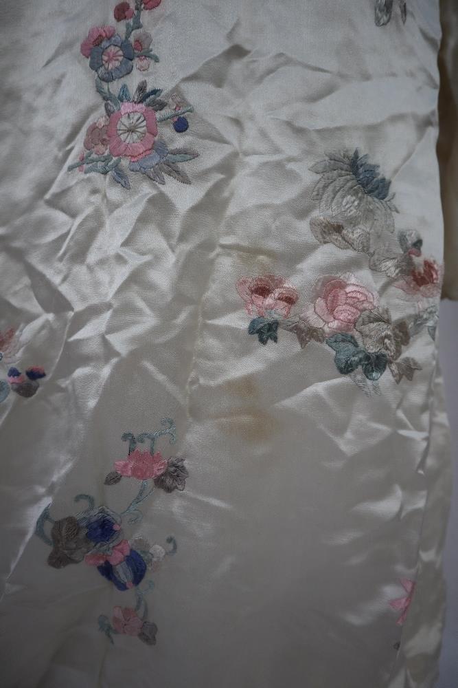 A Japanese silk kimono, the cream ground embroidered with roses and chrysanthemums, - Image 3 of 4