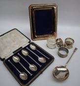 A George V silver seal end spoon, Sheffield, 1932 together with a set of six silver spoons,