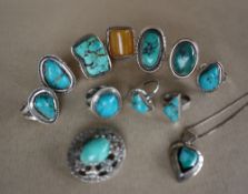 A collection of turquoise and silver dress rings together with other rings etc
