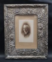 A Japanese white metal photograph frame of rectangular form,