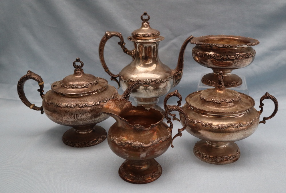 American Silver - An R W & S Sterling silver five piece teaset with a scrolling leaf and flower