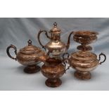 American Silver - An R W & S Sterling silver five piece teaset with a scrolling leaf and flower
