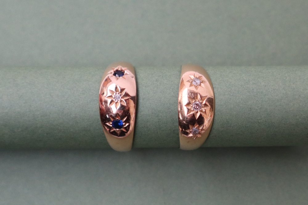 An 18ct gold sapphire and diamond gypsy ring set with two round faceted sapphires and a central old - Image 2 of 6