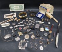 A silver vesta case together with assorted costume jewellery, including coin brooches, fob watch,