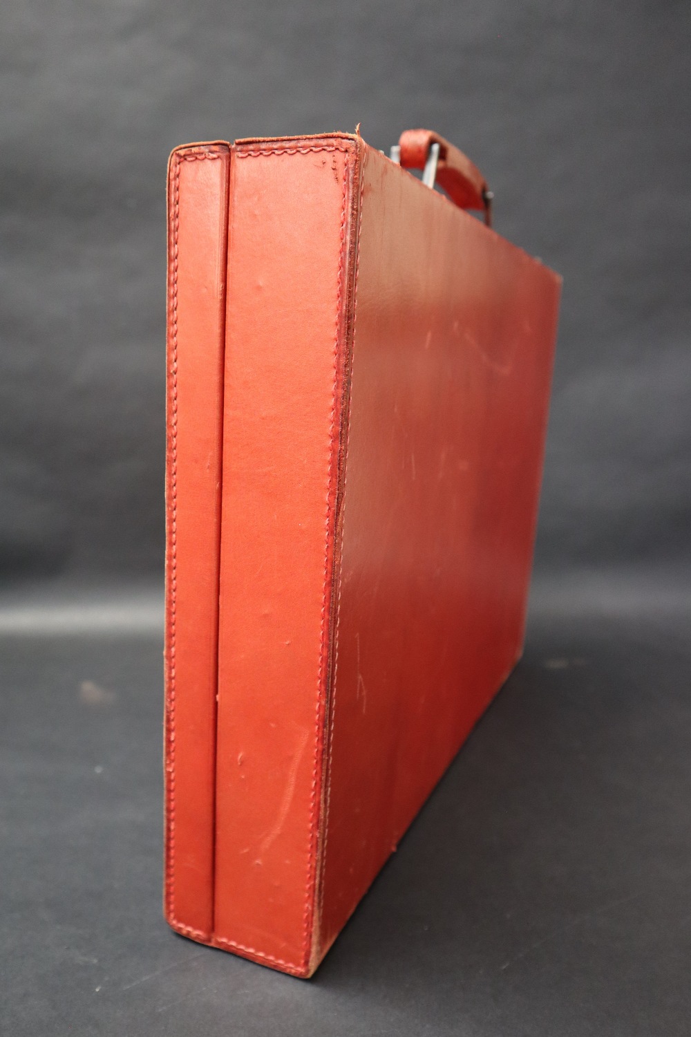 S T Dupont, a red leather travelling case fitted with two brushes, three bottles, easel mirror, - Image 17 of 20