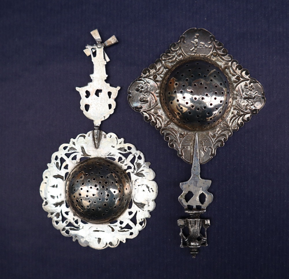 Two continental white metal sifting spoons with figural tops and leaf scrolls, - Image 3 of 3