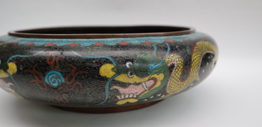 A Japanese cloisonne enamel bowl, decorated to the centre with a dragon to a black cloud ground, - Image 3 of 9