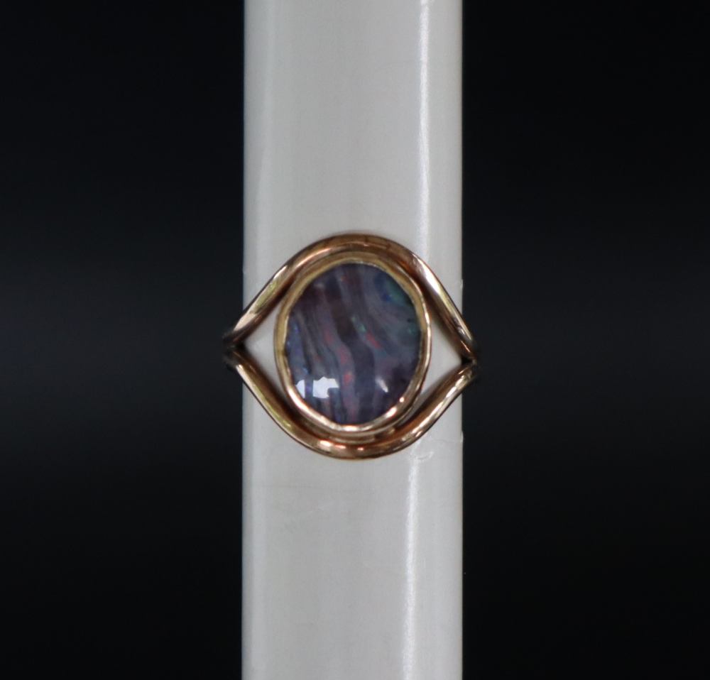 A 9ct gold ring, set with an oval opal panel, size M, approximately 5. - Image 2 of 5