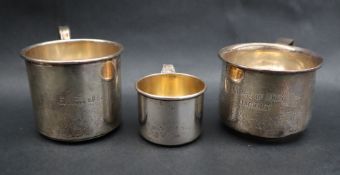 American silver - Two Sterling silver mugs together with a smaller christening mug,