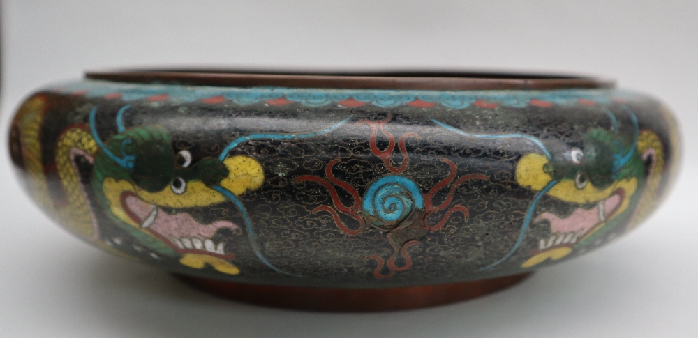 A Japanese cloisonne enamel bowl, decorated to the centre with a dragon to a black cloud ground, - Image 6 of 9