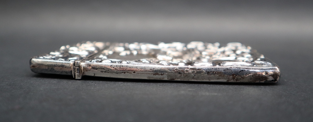 An Edwardian silver card carrying case with embossed decoration of a stag and scrolling leaves, - Image 4 of 4