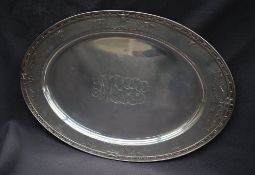 American Silver - A large Sterling silver serving platter of oval form decorated with swags,