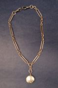 A 9ct gold double Albert watch chain, with small oval and large oval links, to a T bar, 40cm long,