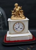 A 19th century white marble clock with a gilt metal surmount of a boy feeding chicken whilst seated