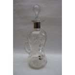 An Edward VII silver topped and glass decanter,