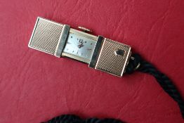 A continental yellow metal purse watch, hallmarked 750, of rectangular form,