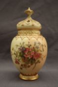 A Royal Worcester pot pourri vase and cover, the cover of crown shape with a pointed finial,