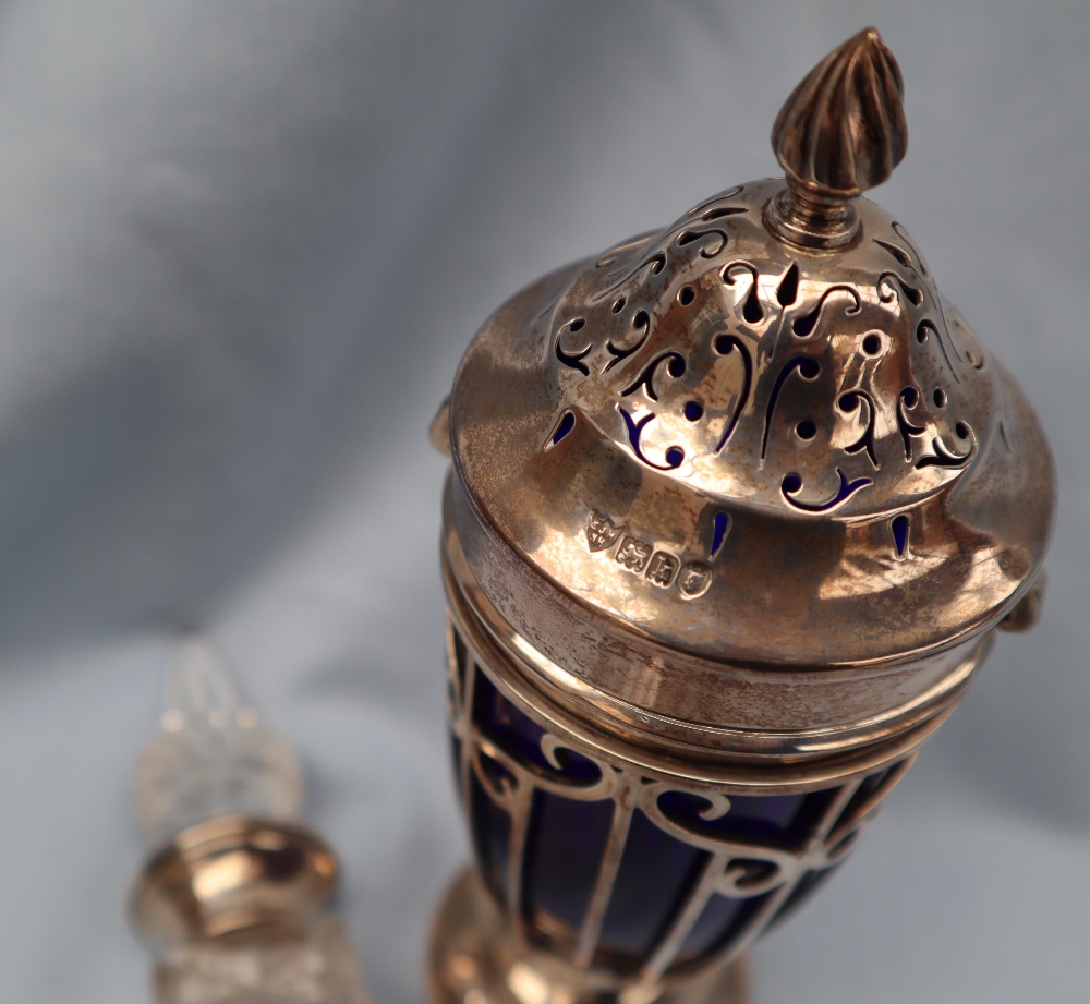 An Edward VII silver and blue glass sugar caster with a flame finial and pierced domed lid, - Image 3 of 4