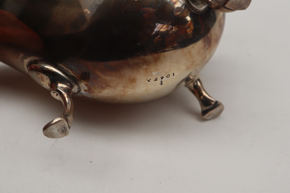 A pair of George VI silver sauce boats of usual form with ring handle and three legs with pointed - Image 3 of 4
