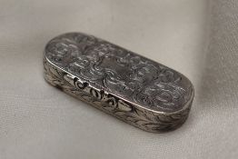 A Victorian silver vinaigrette, of oval form decorated with scrolling leaves and a vacant cartouche,