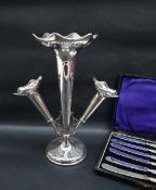 A George V silver epergne with a central flared trumpet with a pierced rim,