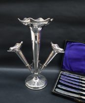 A George V silver epergne with a central flared trumpet with a pierced rim,