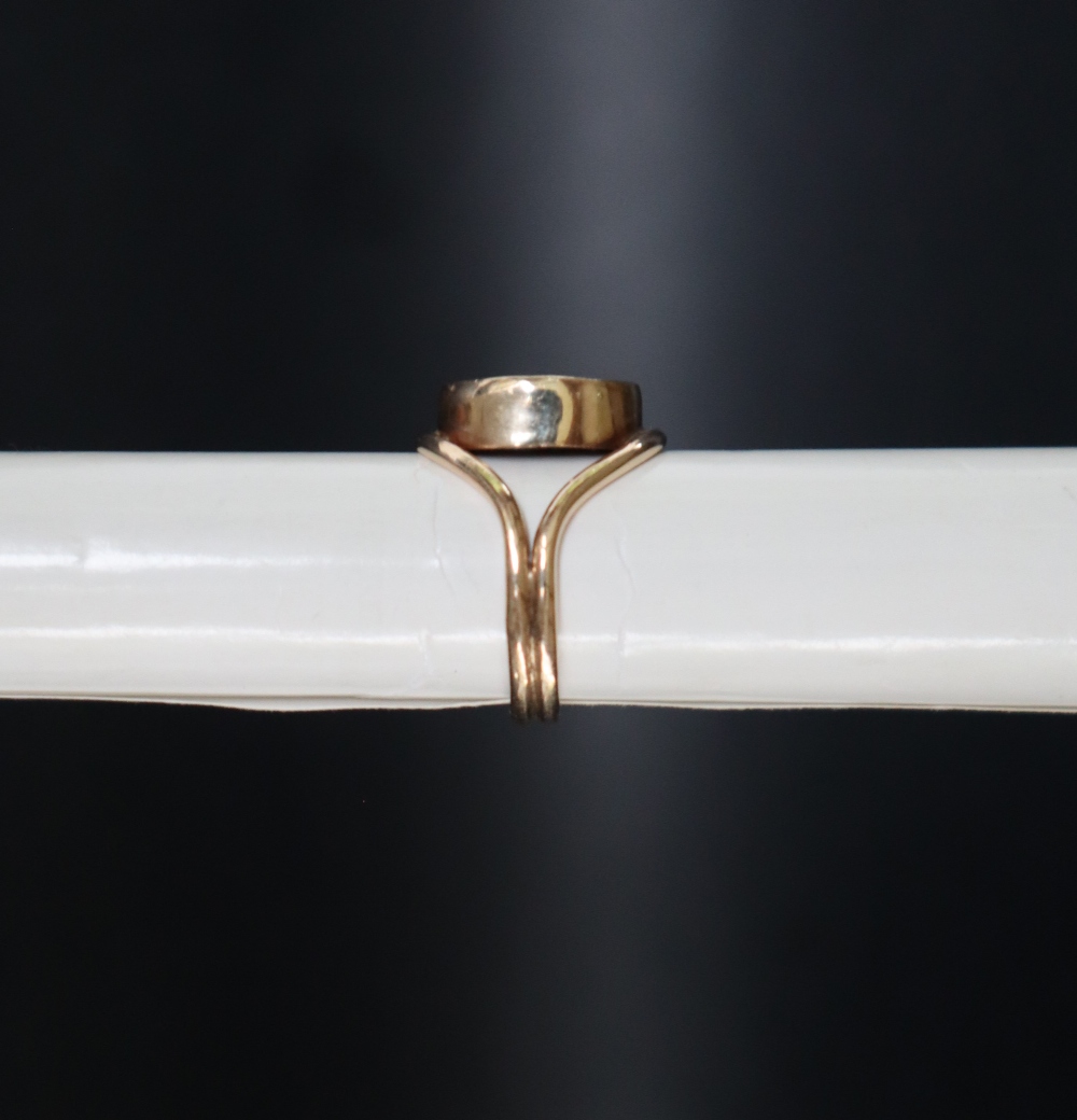A 9ct gold ring, set with an oval opal panel, size M, approximately 5. - Image 3 of 5