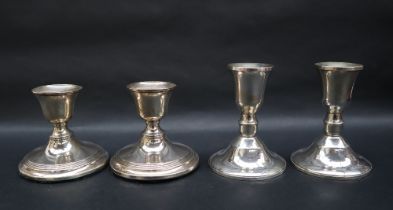 A pair of Edward VIII silver desk candlesticks, of squat form on a circular base, Birmingham, 1908,