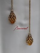 A Baccarat amber glass & silver-gilt necklace with heavy cage-work pendant either end; 100cm long,