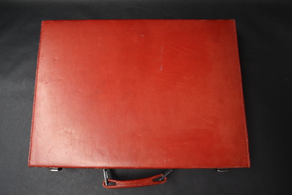 S T Dupont, a red leather travelling case fitted with two brushes, three bottles, easel mirror, - Image 15 of 20